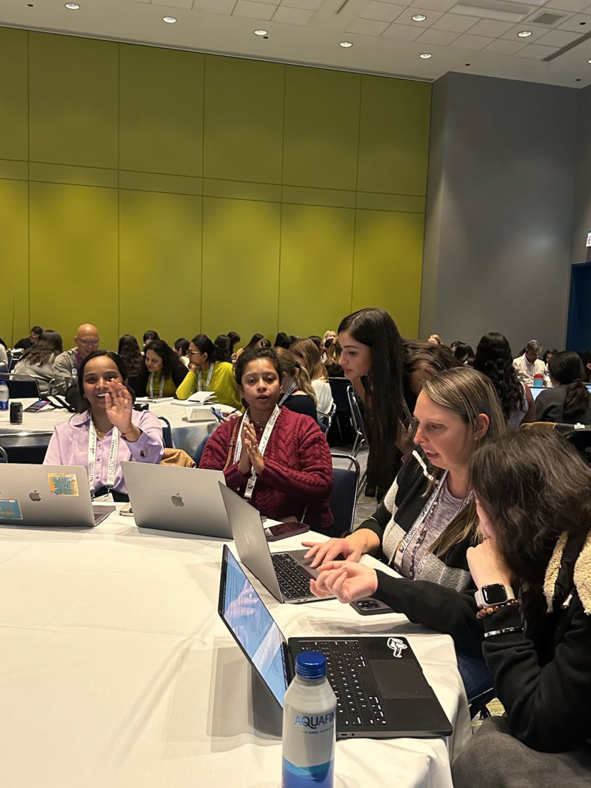 Ayushe helping attendees during the hands-on workshop