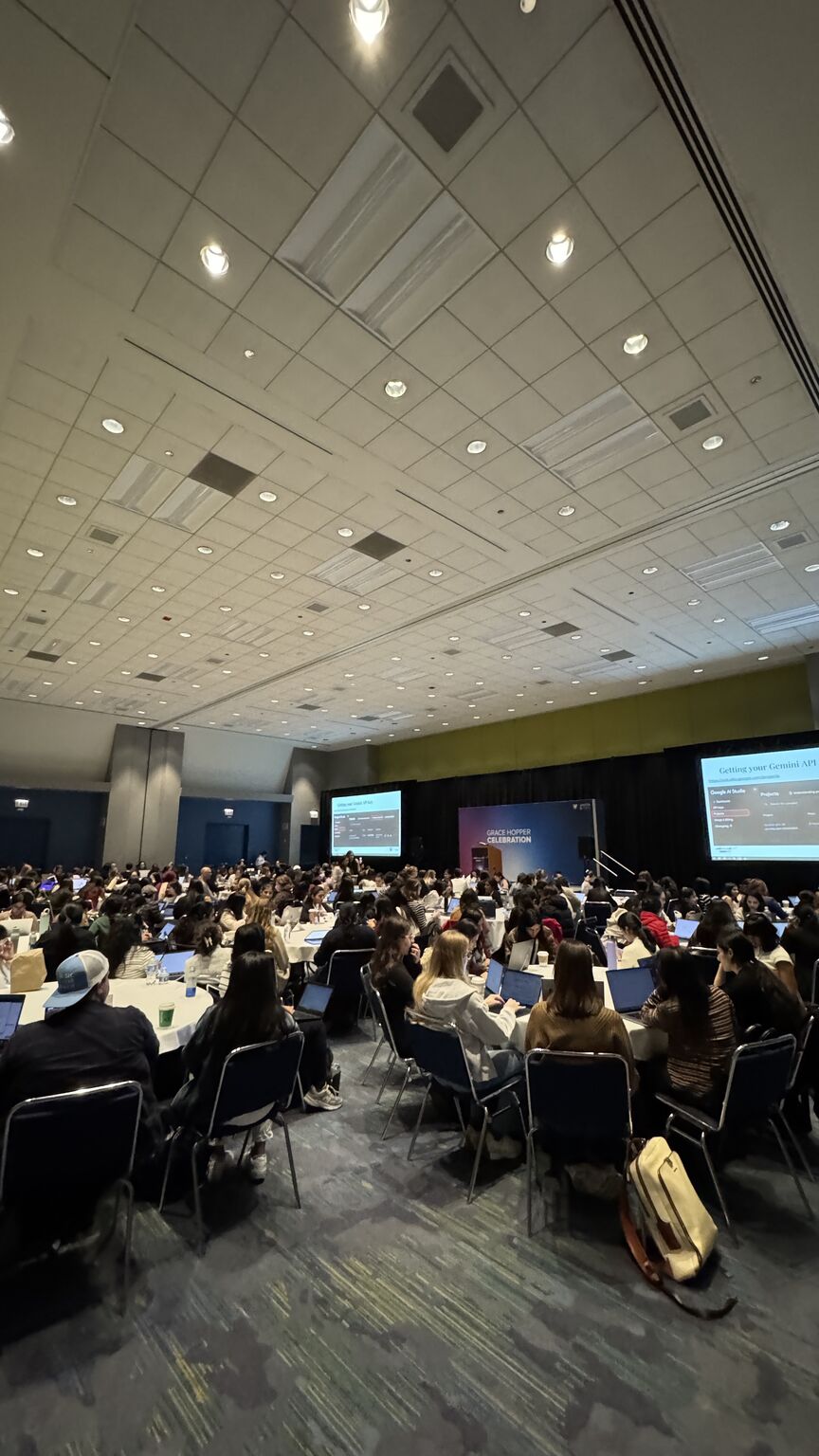 A packed room of attendees building RAG apps